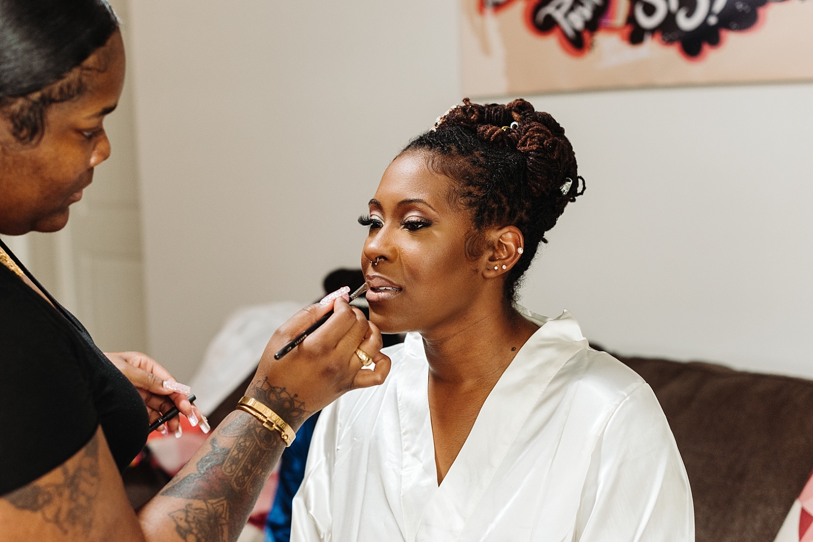bride gets ready in her home makeup artist