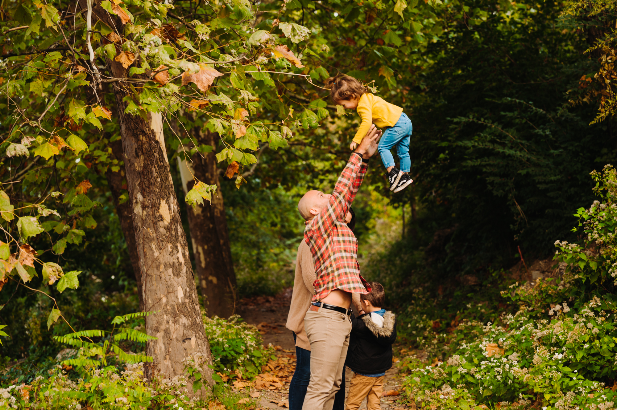 throwing kids in air for philadelphia family photography