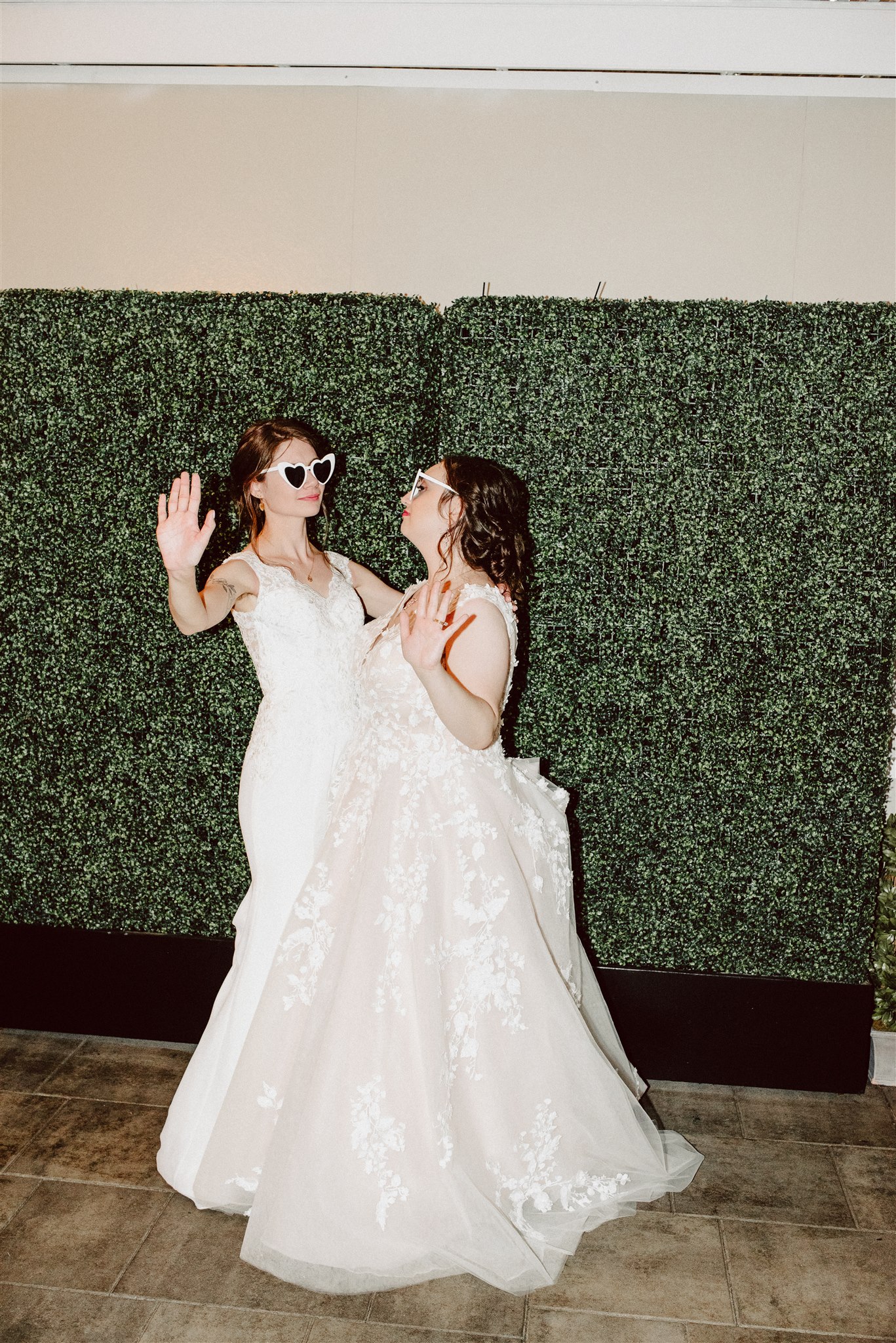 queer newlyweds dancing under the stars at their wedding reception – magical and romantic nighttime photography.