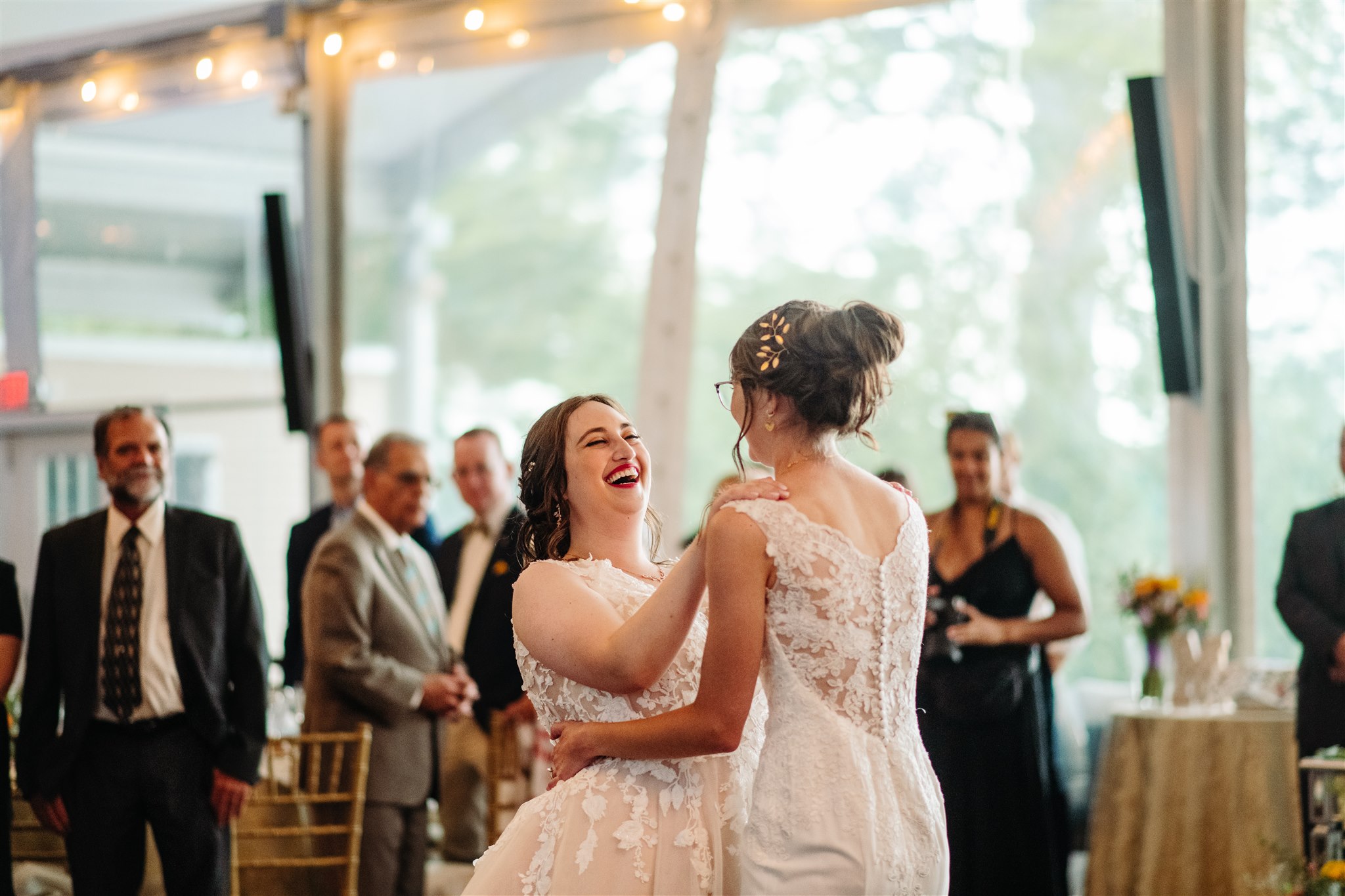 playful newlywed moment at pen ryn estate with lush spring florals – energy, movement, and romance in one shot.