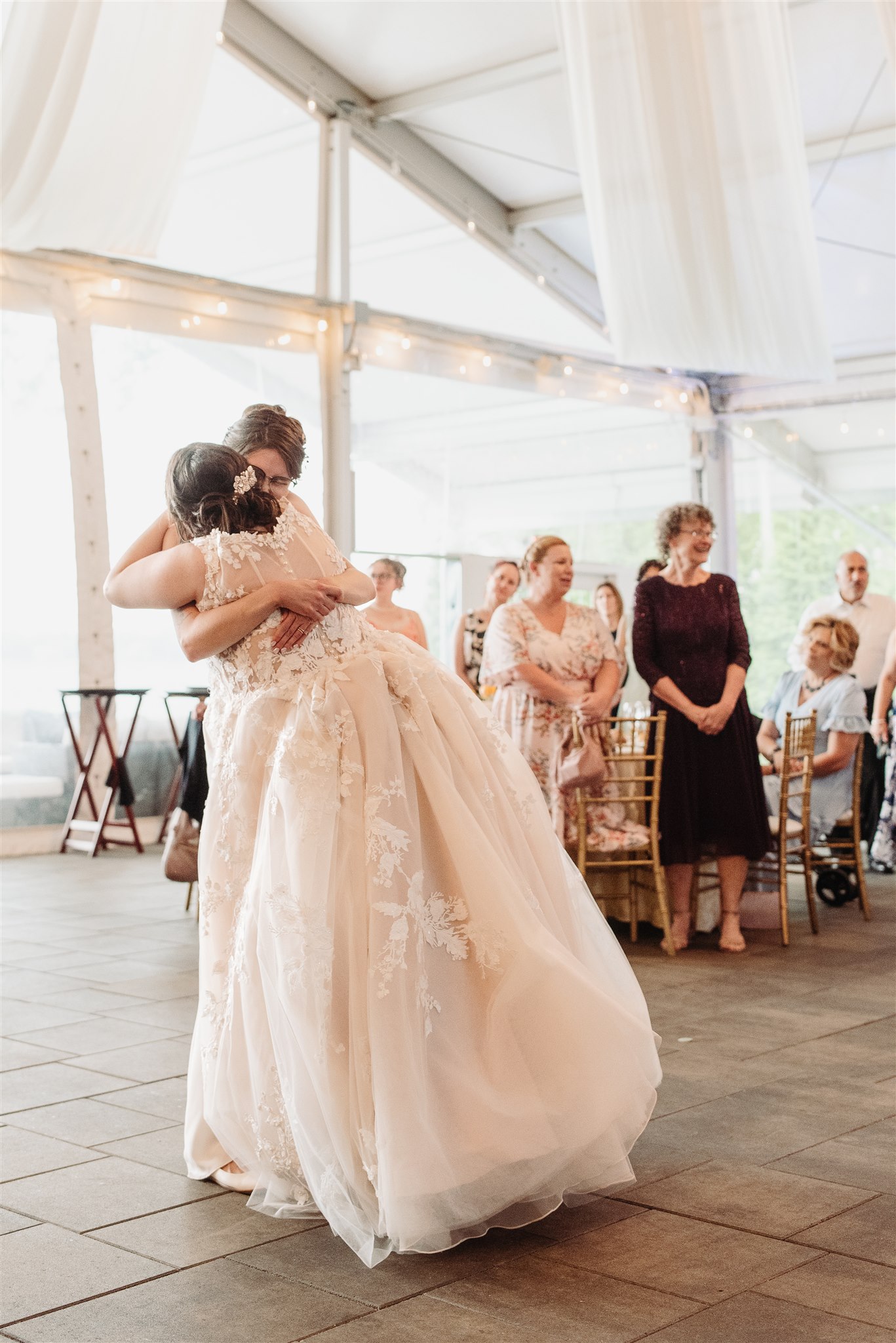 same-sex couple getting dressed for their wedding in bucks county – a heartfelt pre-ceremony moment.