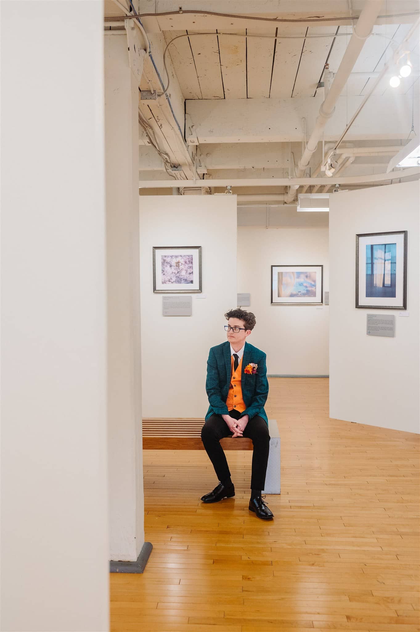 same-sex couple sneaking a quiet moment away from the reception – intimate and romantic storytelling.