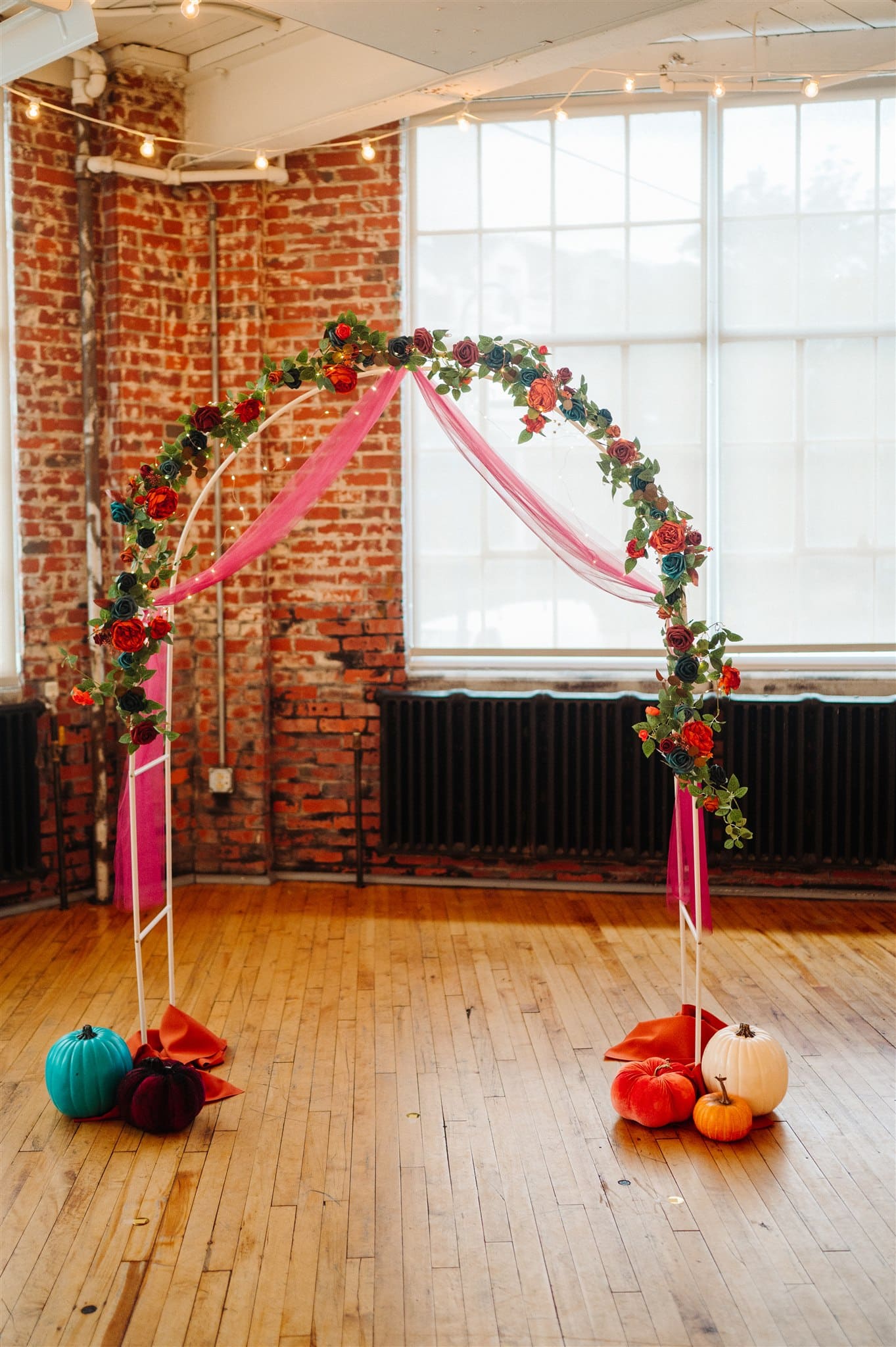 custom cake topper featuring the couple's likeness: a beautifully crafted topper adding a personal touch to the wedding cake.