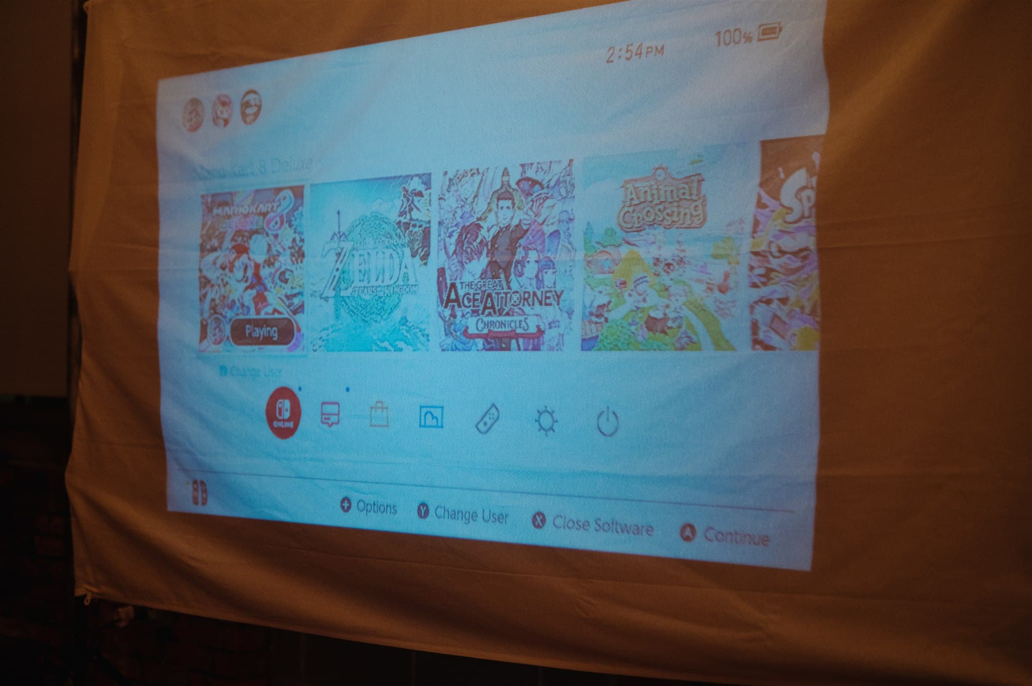 colorful wedding cake with bold artistic design – nontraditional cake cutting moment.