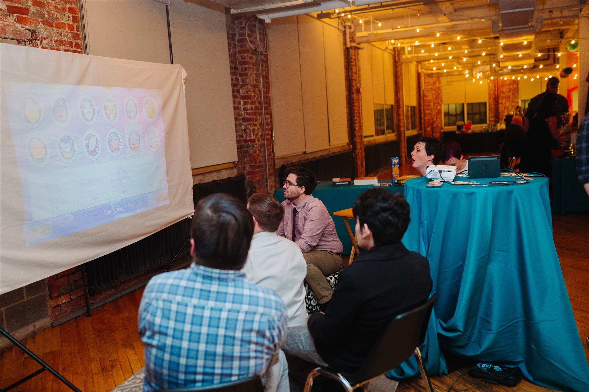 first dance of a same-sex couple in a bold and modern venue – intimate and romantic moment surrounded by art.