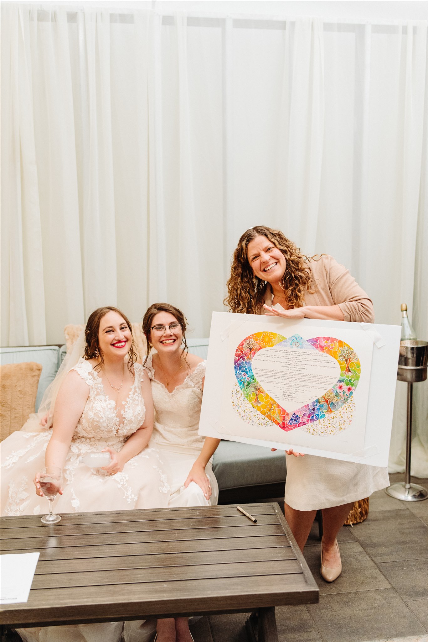 lgbtq+ newlyweds embracing after an unforgettable wedding day – soft, intimate storytelling.