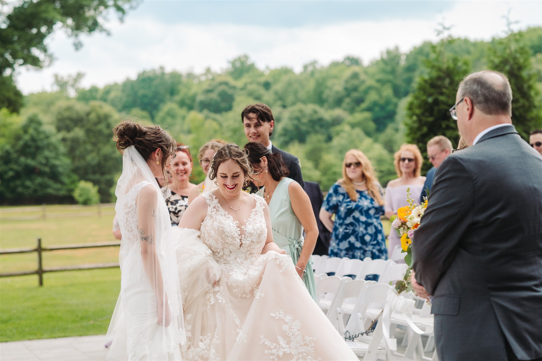 joyful brides sharing a laugh during wedding vows – an intimate and emotional moment filled with love and laughter.