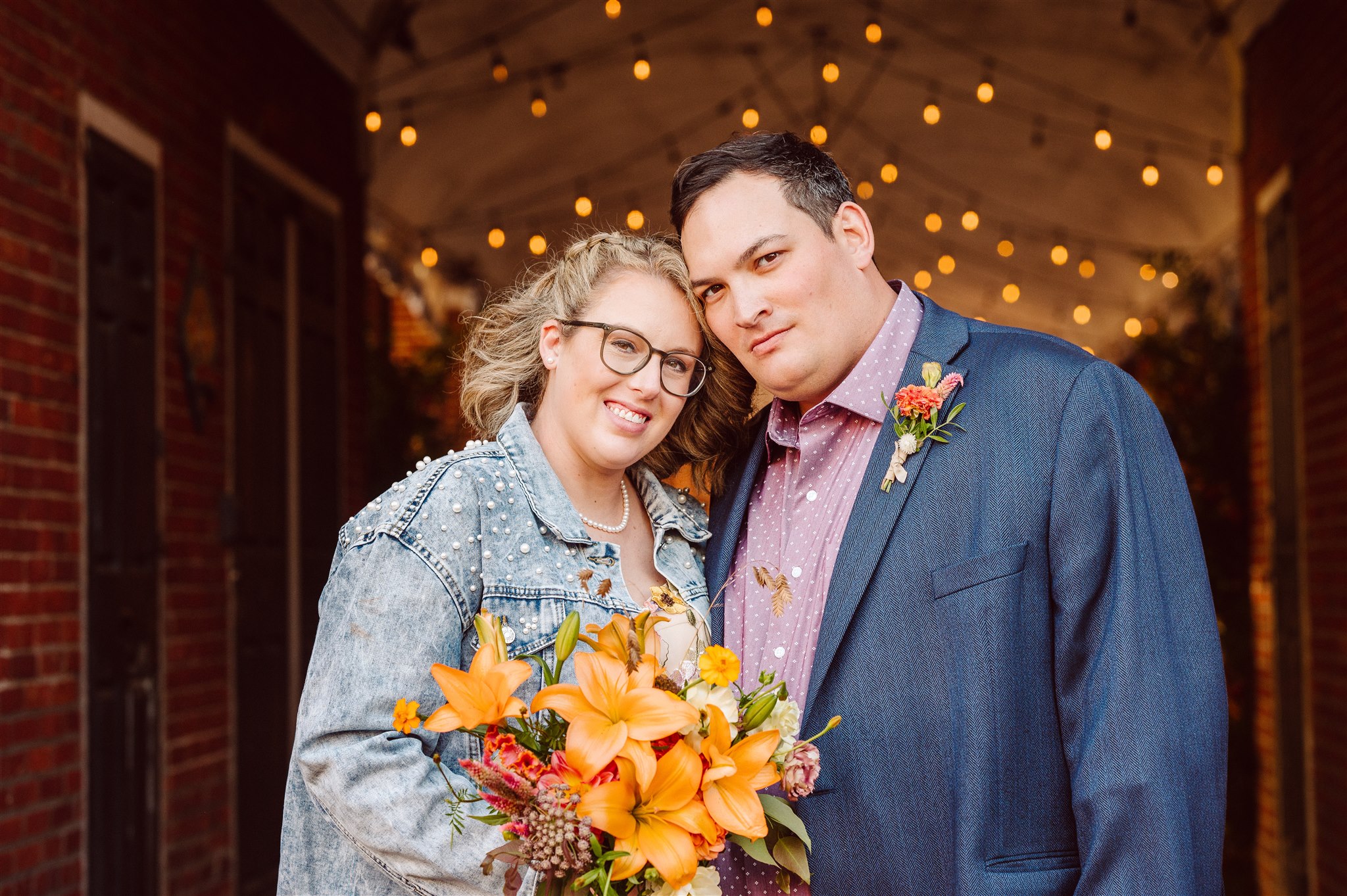 headhouse square micro wedding - ben and nicole embracing in old city
