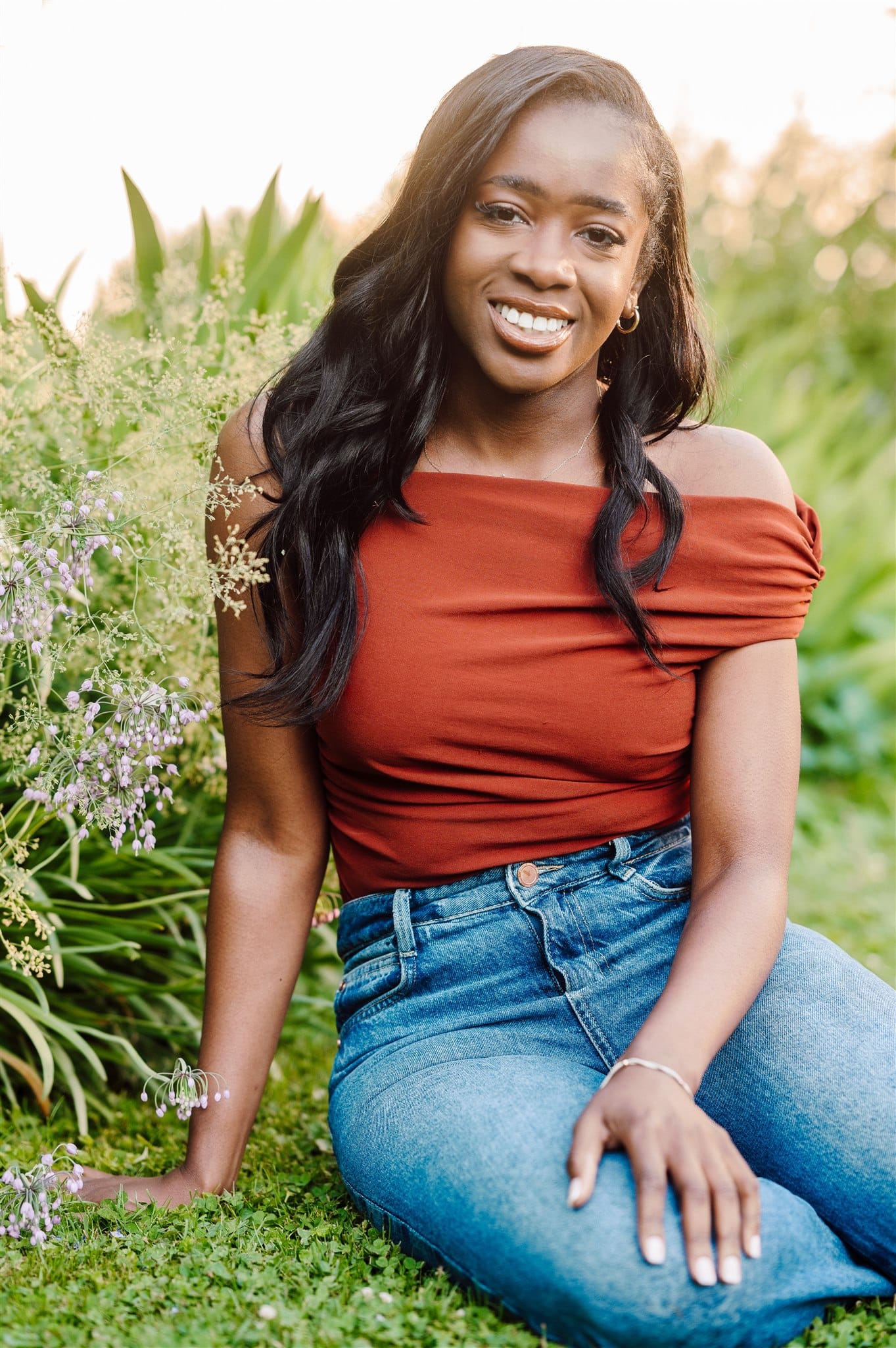 beautiful woman posing for headshot photography in garden